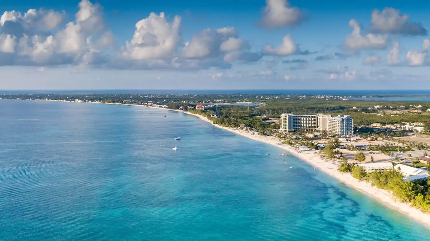 Cayman islands vs antigua. Джорджтаун Каймановы острова. Каймановы острова гражданство. Seven Mile Beach острова Кайман.