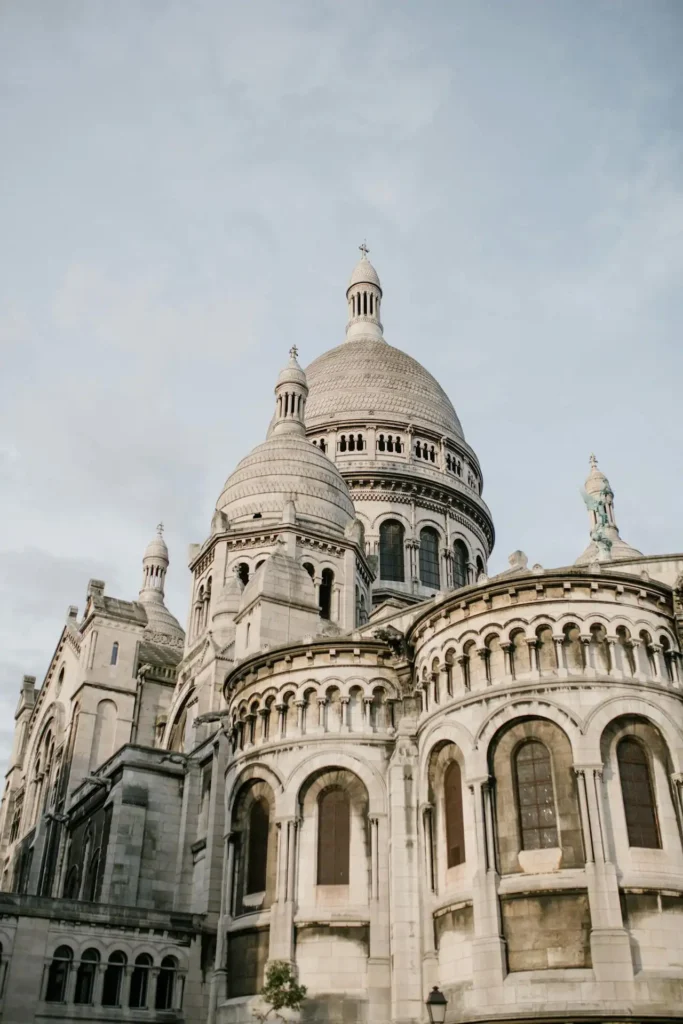 Aged domed Catholic cathedral made of travertine